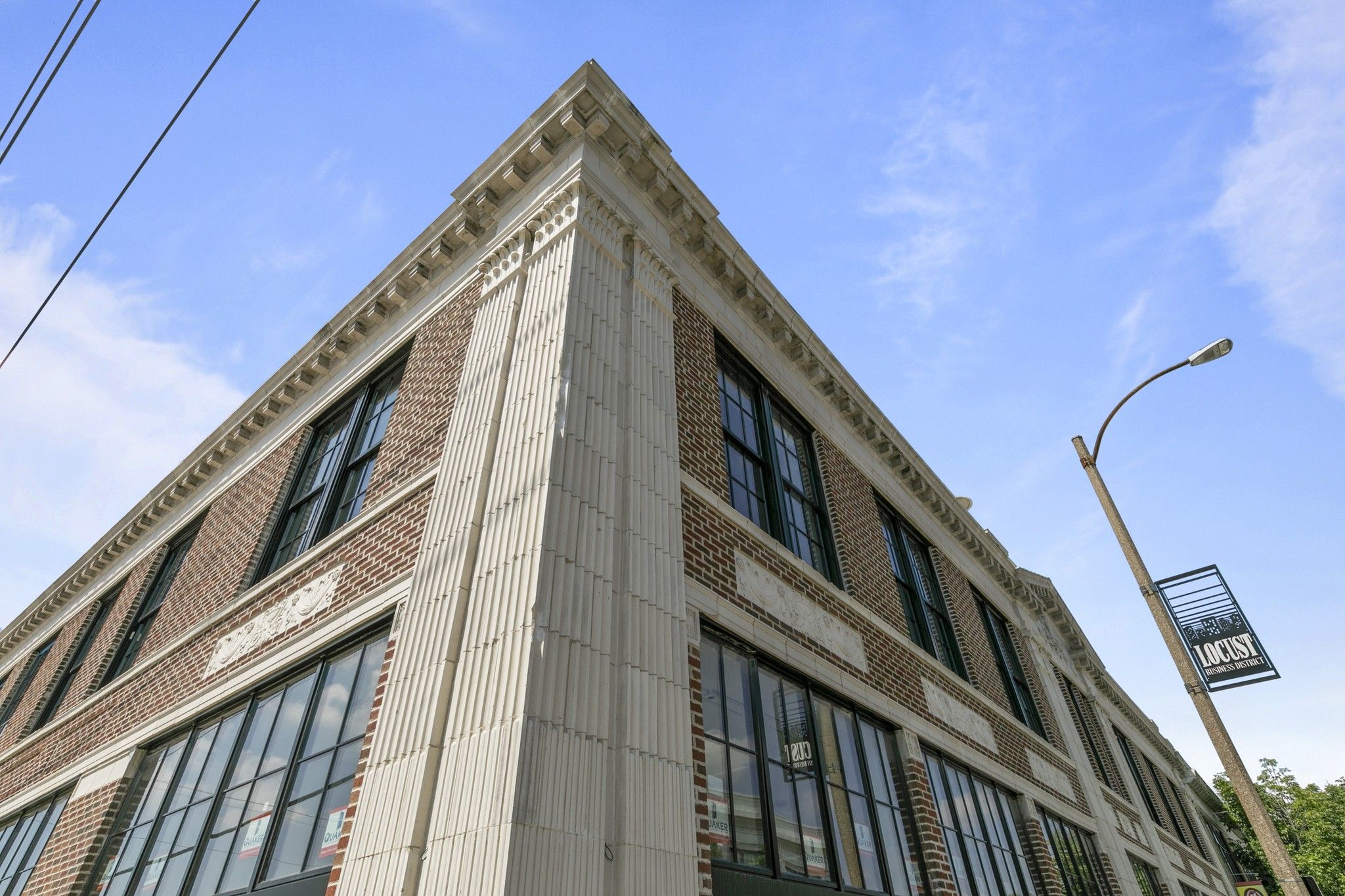 The Nash apartments building exterior against a blue sky